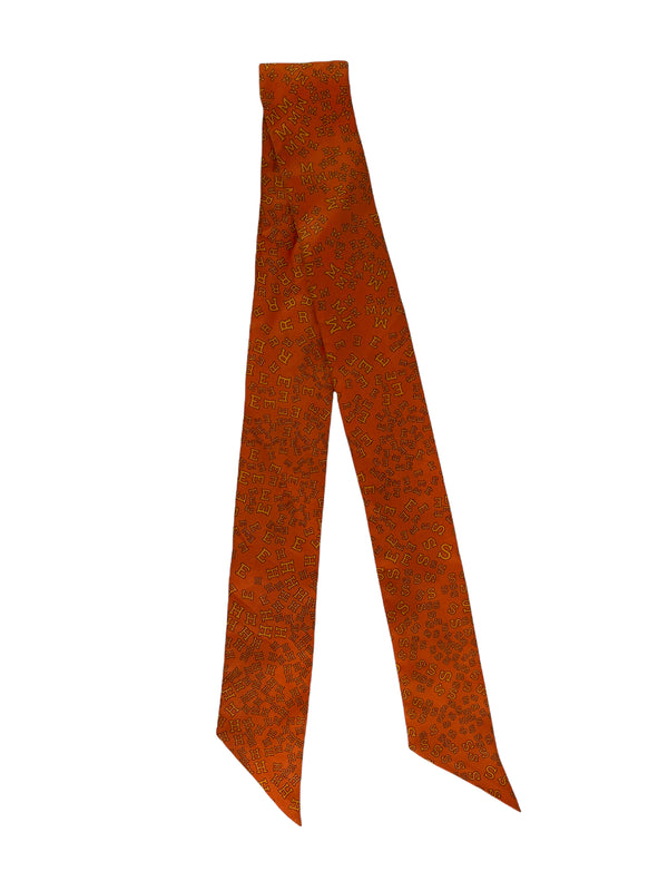 Hermès Orange Silk Printed "Twilly" Scarf.